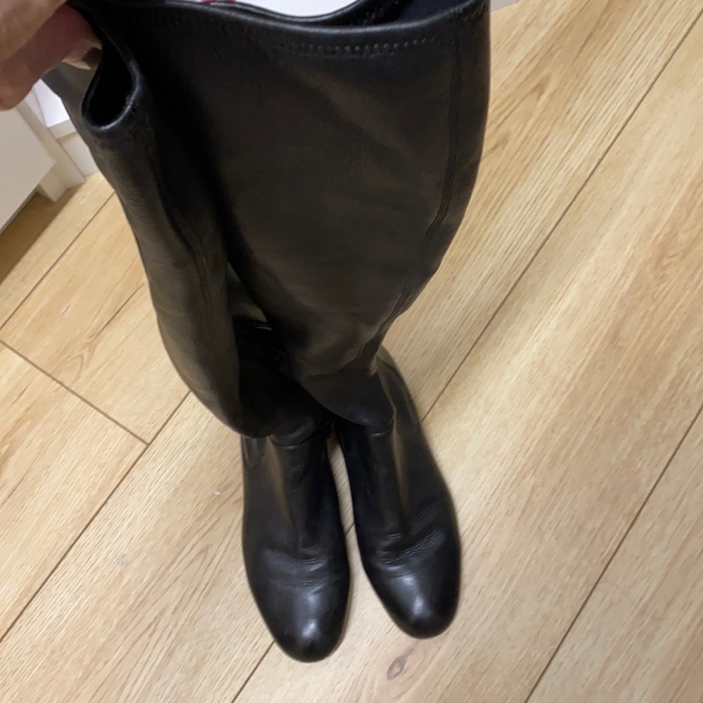 prada lightly worn black leatherboots